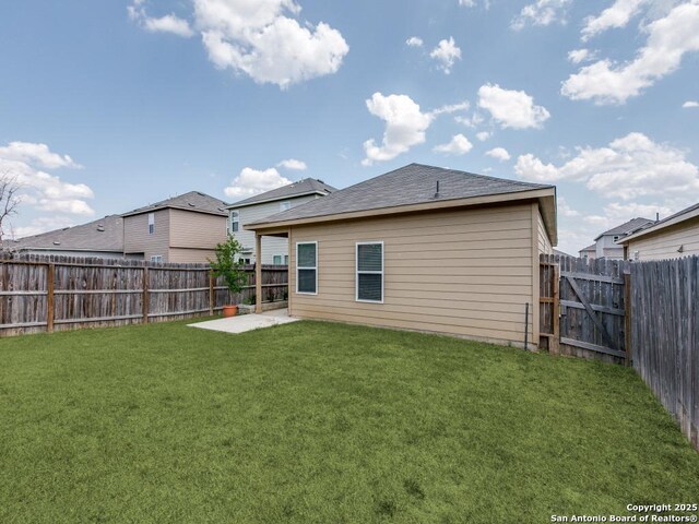 607 Pleasanton Spg, San Antonio, TX 78221 - rear view of property with a patio