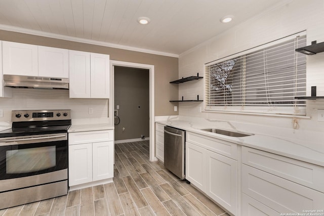 4543 Stradford, San Antonio, TX 78217 - kitchen featuring stainless steel appliances, under cabinet range hood, a sink, open shelves, and white cabinets
