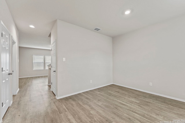 7115 Mesa Clfs, Converse, TX 78109 - empty room with light wood finished floors, baseboards, and recessed lighting