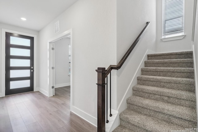 11554 Cottage Pt, San Antonio, TX 78254 - foyer entrance featuring healthy amount of natural light, wood finished floors, baseboards, stairs, and recessed lighting