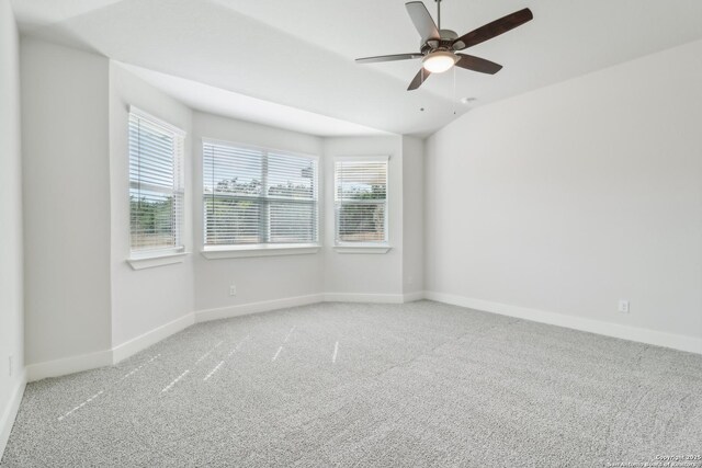 11554 Cottage Pt, San Antonio, TX 78254 - carpeted empty room featuring baseboards, plenty of natural light, and a ceiling fan