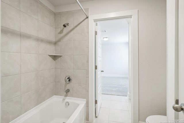 11554 Cottage Pt, San Antonio, TX 78254 - full bathroom featuring shower / bathtub combination, toilet, tile patterned floors, and baseboards