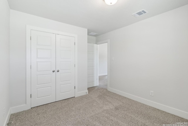 11554 Cottage Pt, San Antonio, TX 78254 - unfurnished bedroom featuring carpet, baseboards, and a closet