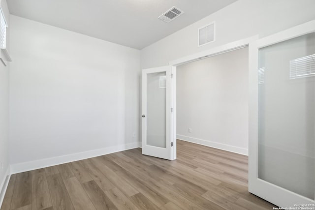 11554 Cottage Pt, San Antonio, TX 78254 - unfurnished bedroom with wood finished floors and baseboards