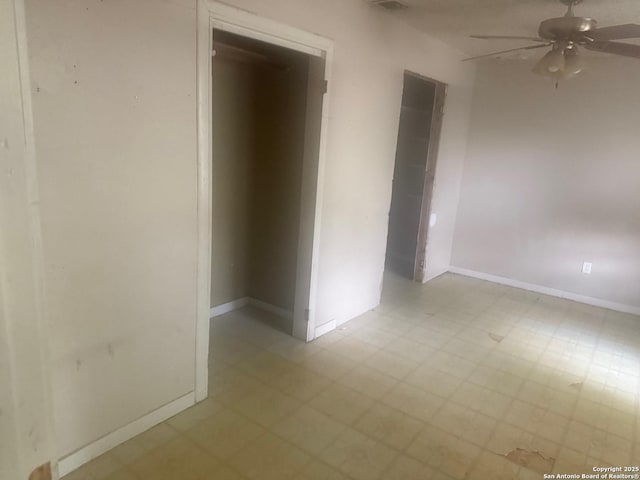 924 Santa Monica, San Antonio, TX 78201 - empty room with tile patterned floors, ceiling fan, and baseboards