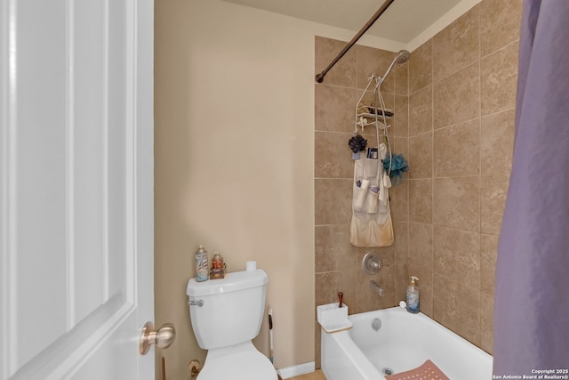 5602 Casa Martin, Katy, TX 77449 - bathroom featuring shower / tub combo with curtain and toilet