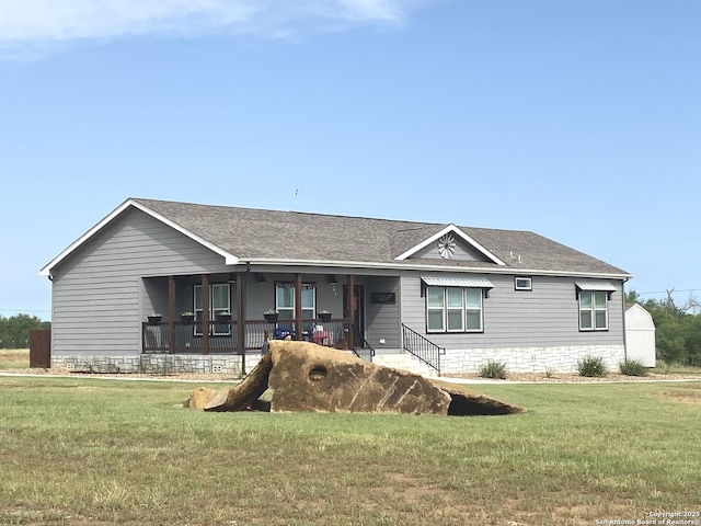 1727 Fm 1346, La Vernia, TX 78121 - ranch-style home with a front lawn, a porch, and a shingled roof