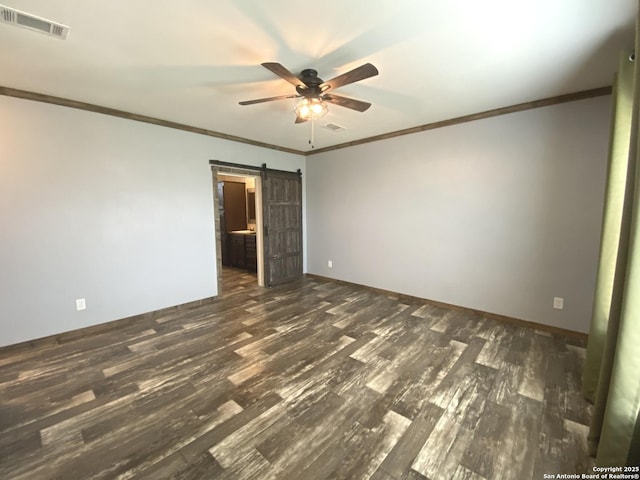 1727 Fm 1346, La Vernia, TX 78121 - spare room with ceiling fan, wood finished floors, crown molding, baseboards, and a barn door