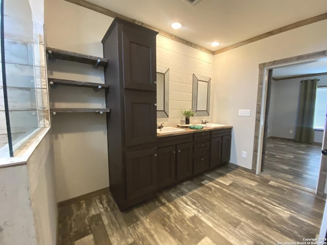 1727 Fm 1346, La Vernia, TX 78121 - bathroom with wood finished floors, double vanity, baseboards, and recessed lighting
