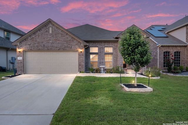 10128 Bussang, Schertz, TX 78154 - french provincial home featuring brick siding, concrete driveway, a lawn, an attached garage, and a shingled roof