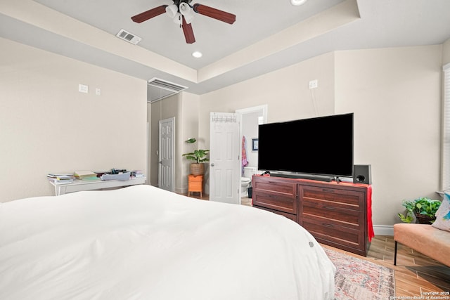 9927 Sandy Fld, San Antonio, TX 78245 - bedroom with wood finished floors, baseboards, a raised ceiling, recessed lighting, and ceiling fan
