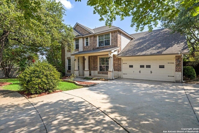 2630 Starlight Ct, San Antonio, TX 78261 - view of front of property featuring brick siding, driveway, a garage, and a shingled roof