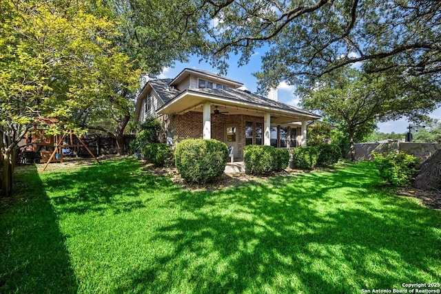 2630 Starlight Ct, San Antonio, TX 78261 - view of front of property featuring brick siding, a chimney, ceiling fan, and a porch