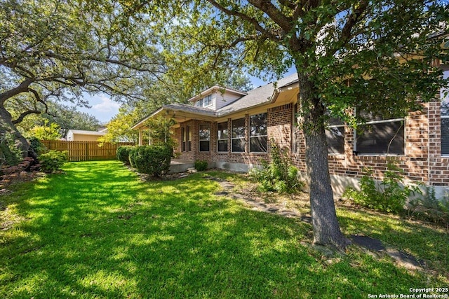 2630 Starlight Ct, San Antonio, TX 78261 - rear view of property with brick siding