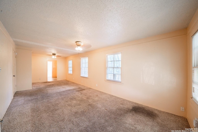 115 Elmo, San Antonio, TX 78225 - carpeted spare room with a textured ceiling and a ceiling fan