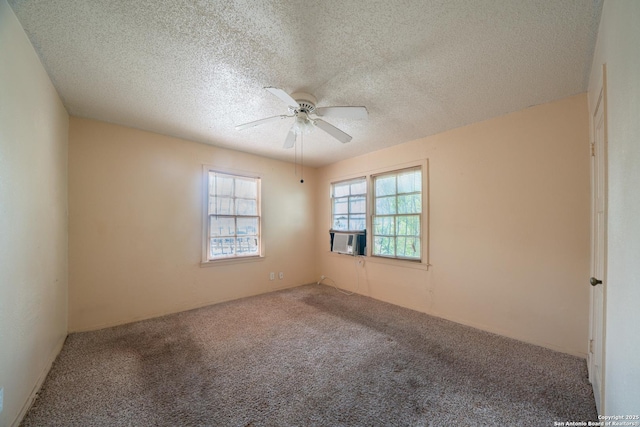 115 Elmo, San Antonio, TX 78225 - unfurnished room featuring a ceiling fan, carpet flooring, and a textured ceiling