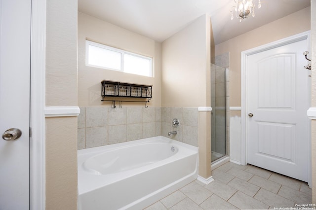 15106 Field Sparrow, San Antonio, TX 78253 - full bathroom featuring tile patterned flooring, a bath, and a shower with shower door
