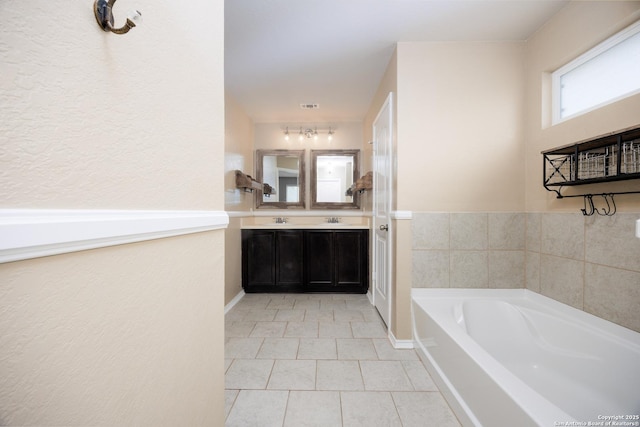 15106 Field Sparrow, San Antonio, TX 78253 - bathroom featuring a bath, vanity, and tile patterned flooring