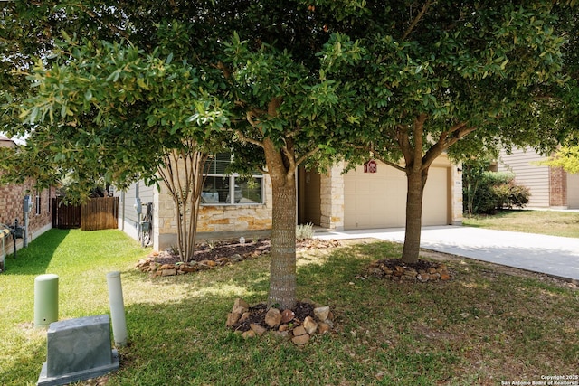 15106 Field Sparrow, San Antonio, TX 78253 - obstructed view of property with concrete driveway, an attached garage, and stone siding