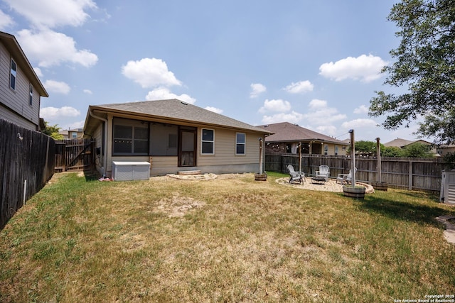 15106 Field Sparrow, San Antonio, TX 78253 - rear view of house featuring an outdoor fire pit and a shingled roof