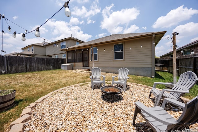 15106 Field Sparrow, San Antonio, TX 78253 - back of property featuring an outdoor fire pit and a sunroom