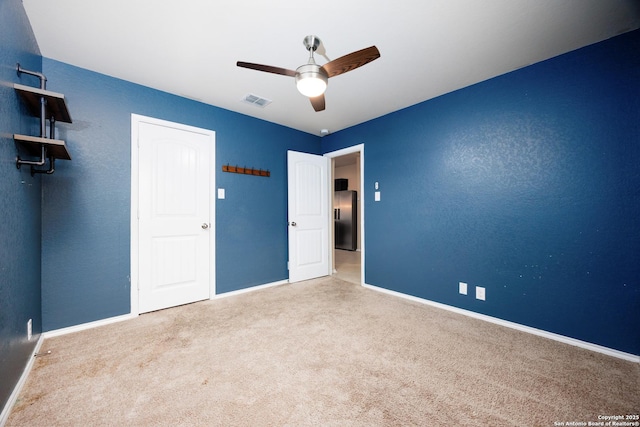 15106 Field Sparrow, San Antonio, TX 78253 - unfurnished bedroom with carpet flooring, baseboards, freestanding refrigerator, and a ceiling fan