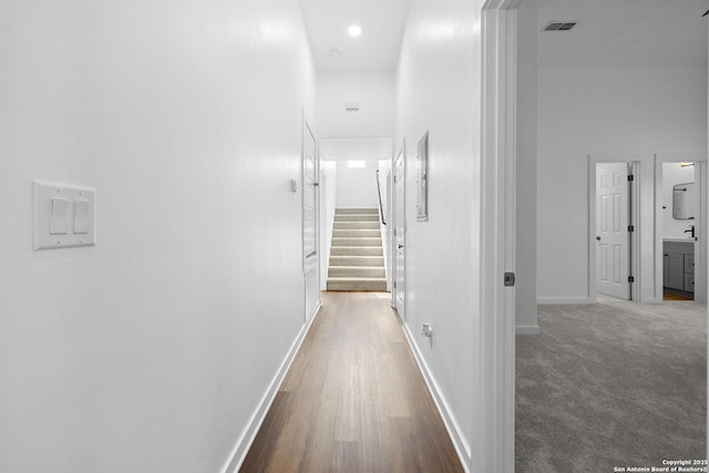 377 County Road 444, Hondo, TX 78861 - corridor with stairs, baseboards, and wood finished floors