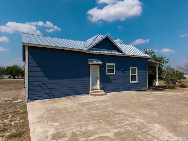 377 County Road 444, Hondo, TX 78861 - view of front of property with metal roof, a patio area, and entry steps