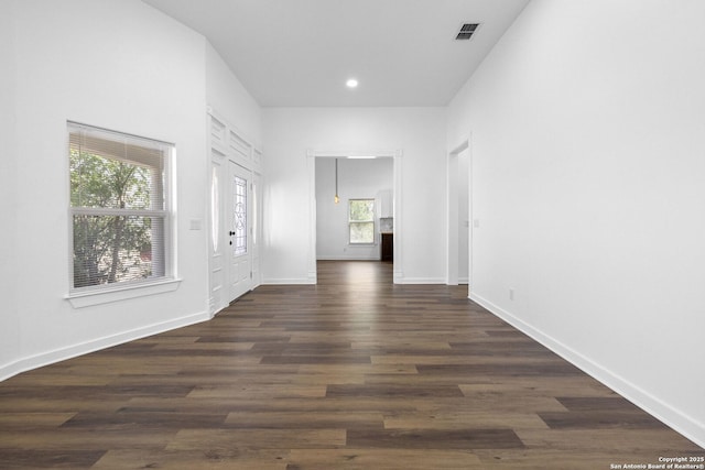 377 County Road 444, Hondo, TX 78861 - unfurnished room featuring dark wood finished floors, baseboards, and recessed lighting