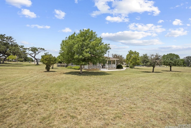 220 Glenvalley, Bandera, TX 78003 - view of grassy yard with covered porch