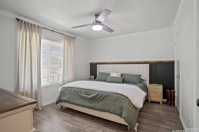 220 Glenvalley, Bandera, TX 78003 - bedroom with ornamental molding, wood finished floors, baseboards, and a ceiling fan