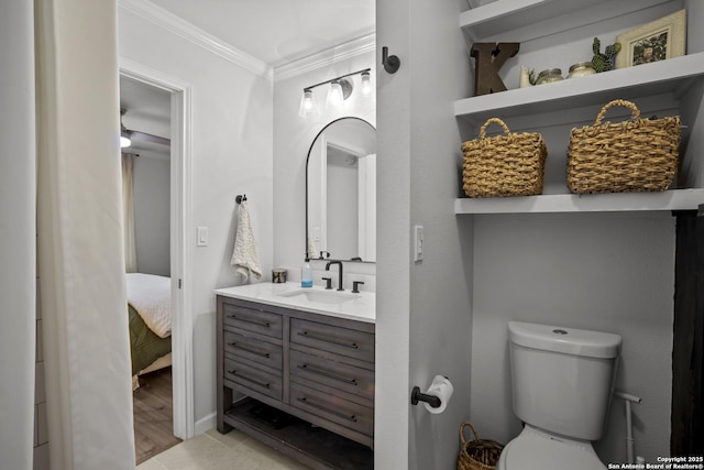 220 Glenvalley, Bandera, TX 78003 - ensuite bathroom with vanity, crown molding, and toilet