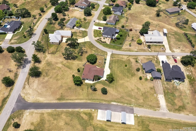 220 Glenvalley, Bandera, TX 78003 - aerial view of property and surrounding area with nearby suburban area