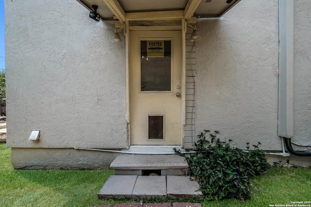 1230 Churing, San Antonio, TX 78245 - view of exterior entry featuring stucco siding