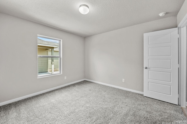 4267 Winston Way, New Braunfels, TX 78130 - carpeted spare room with a textured ceiling and baseboards