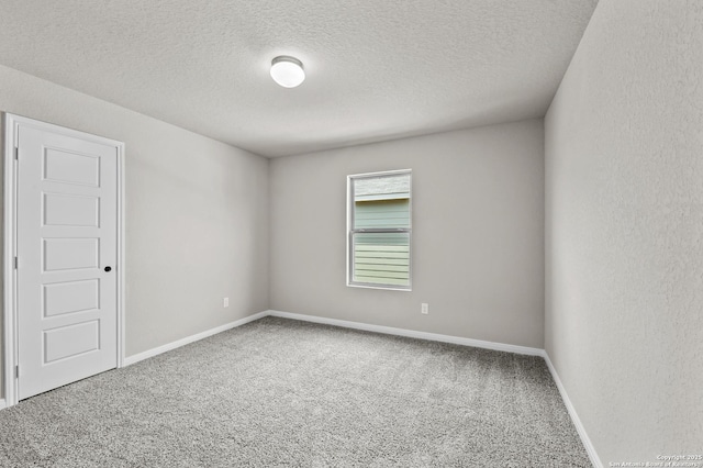 4267 Winston Way, New Braunfels, TX 78130 - carpeted empty room featuring a textured ceiling and baseboards