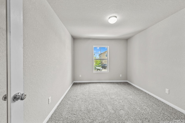 4267 Winston Way, New Braunfels, TX 78130 - unfurnished room with carpet flooring, a textured wall, a textured ceiling, and baseboards