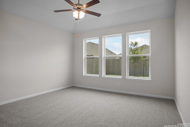 13442 Cosette Xing, San Antonio, TX 78253 - spare room featuring carpet, baseboards, and a ceiling fan
