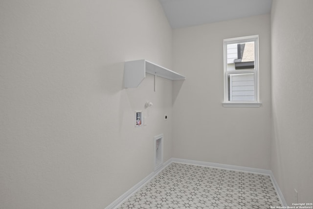 13442 Cosette Xing, San Antonio, TX 78253 - laundry area with light flooring, hookup for a gas dryer, hookup for an electric dryer, washer hookup, and baseboards