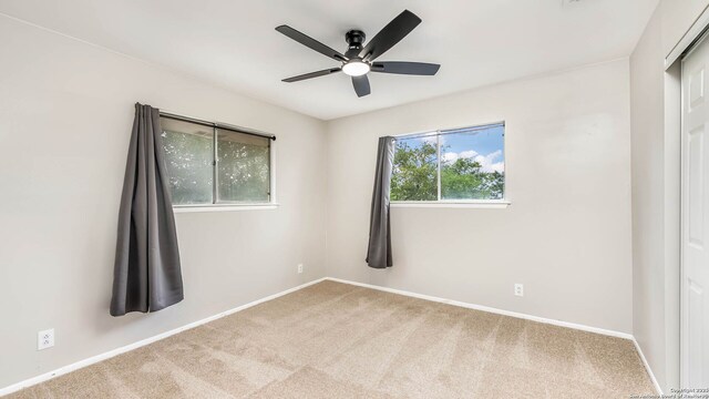 2130 Fort Sumter, San Antonio, TX 78245 - spare room featuring a ceiling fan, carpet floors, and baseboards