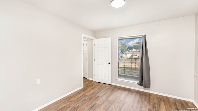 2130 Fort Sumter, San Antonio, TX 78245 - empty room with baseboards and wood finished floors