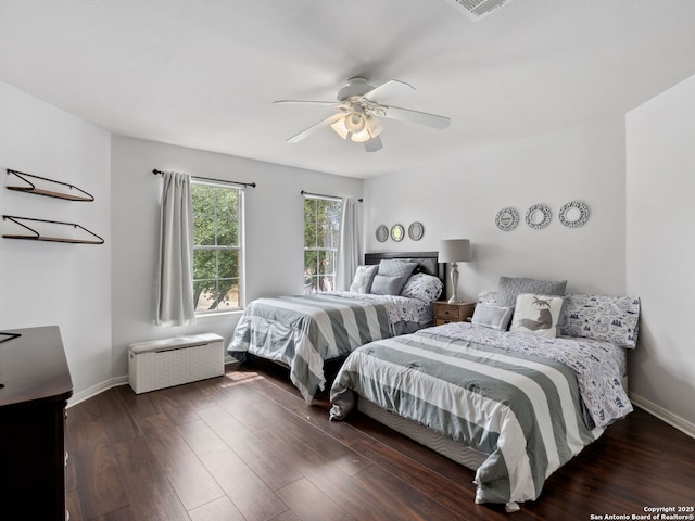 627 Midway, San Antonio, TX 78258 - bedroom with wood finished floors, baseboards, and a ceiling fan