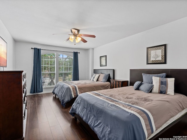 627 Midway, San Antonio, TX 78258 - bedroom with dark wood finished floors and a ceiling fan