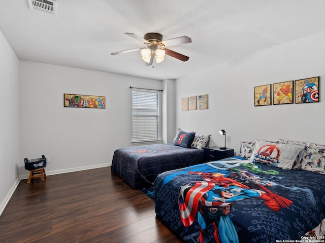 627 Midway, San Antonio, TX 78258 - bedroom with wood finished floors, baseboards, and a ceiling fan