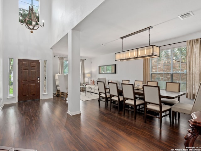 627 Midway, San Antonio, TX 78258 - dining room with wood finished floors, healthy amount of natural light, and baseboards