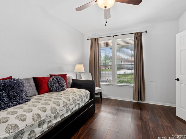 627 Midway, San Antonio, TX 78258 - bedroom with baseboards, dark wood-style floors, and a ceiling fan