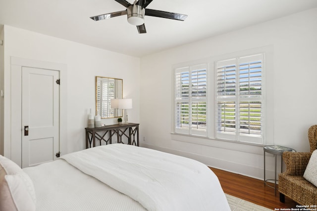 418 Eleanor, San Antonio, TX 78209 - bedroom featuring wood finished floors, a ceiling fan, and baseboards