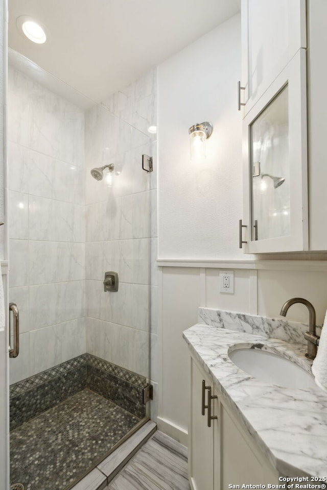 418 Eleanor, San Antonio, TX 78209 - bathroom with a stall shower and vanity