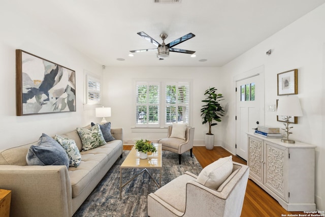 418 Eleanor, San Antonio, TX 78209 - living area with ceiling fan, wood finished floors, and baseboards