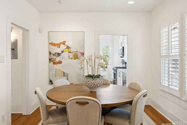 418 Eleanor, San Antonio, TX 78209 - dining room with wood finished floors, baseboards, and recessed lighting
